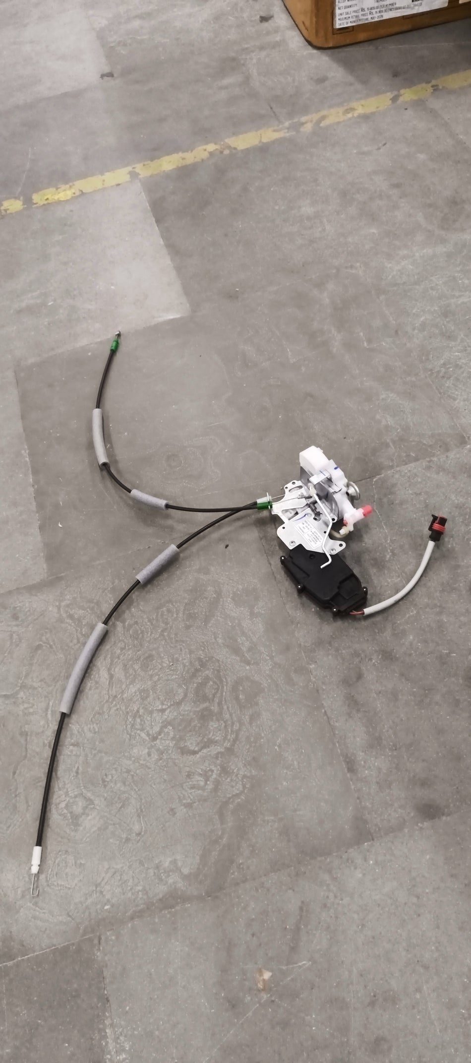 Mahindra ASSY latch for rear door left side, electrical UV/Bolero model, with visible latch mechanism and wiring components.