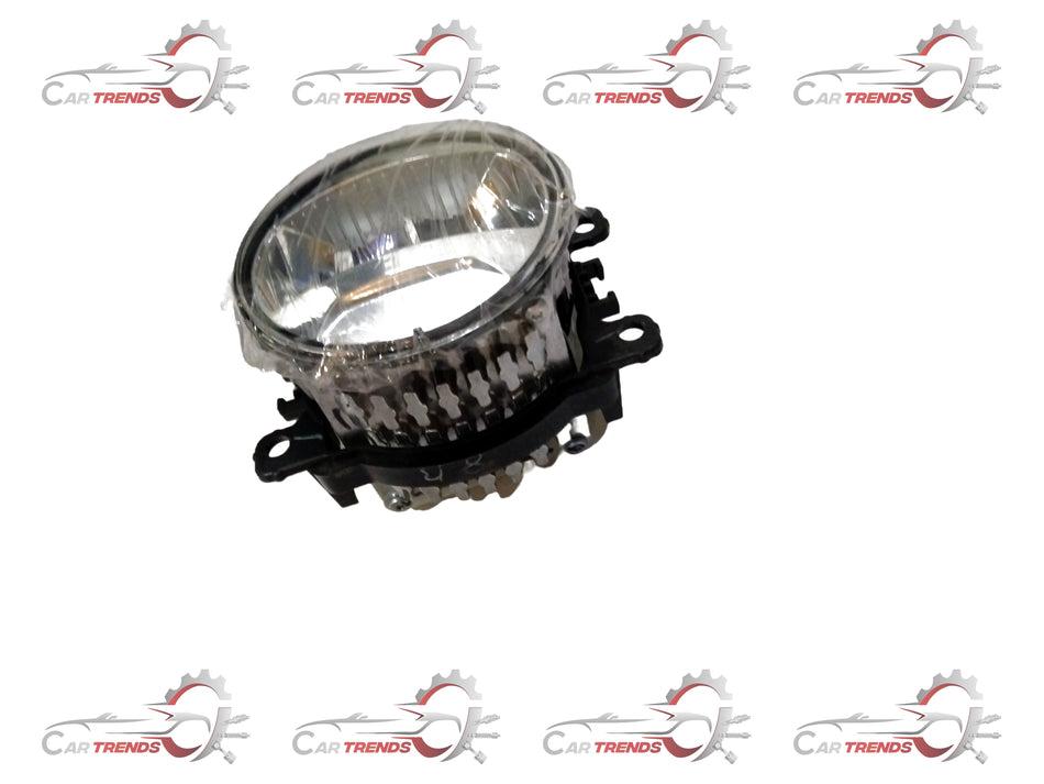 Maruti Suzuki fog lamp assembly with clear lens and mounting brackets for vehicle front lighting.