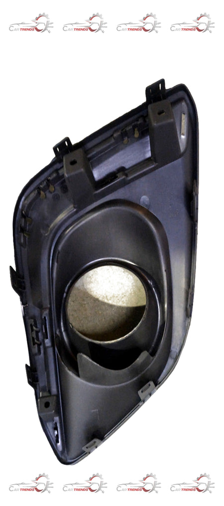 Maruti Suzuki front fog lamp bezel LH with mounting frame, compatible with specific Maruti Suzuki models.