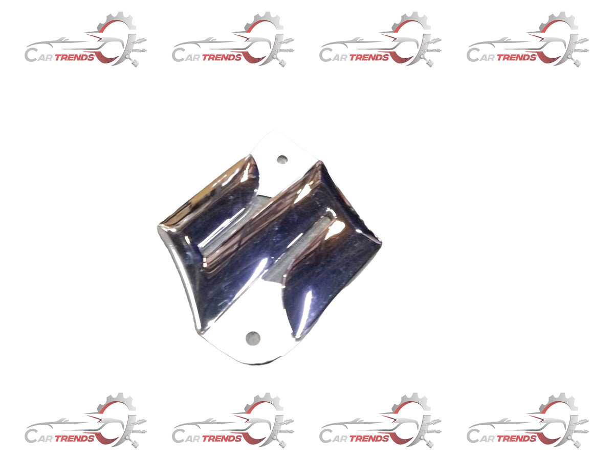 Maruti Suzuki emblem S chrome badge with model number 77811M58J000PG, shiny chrome finish, mounted on a vehicle surface