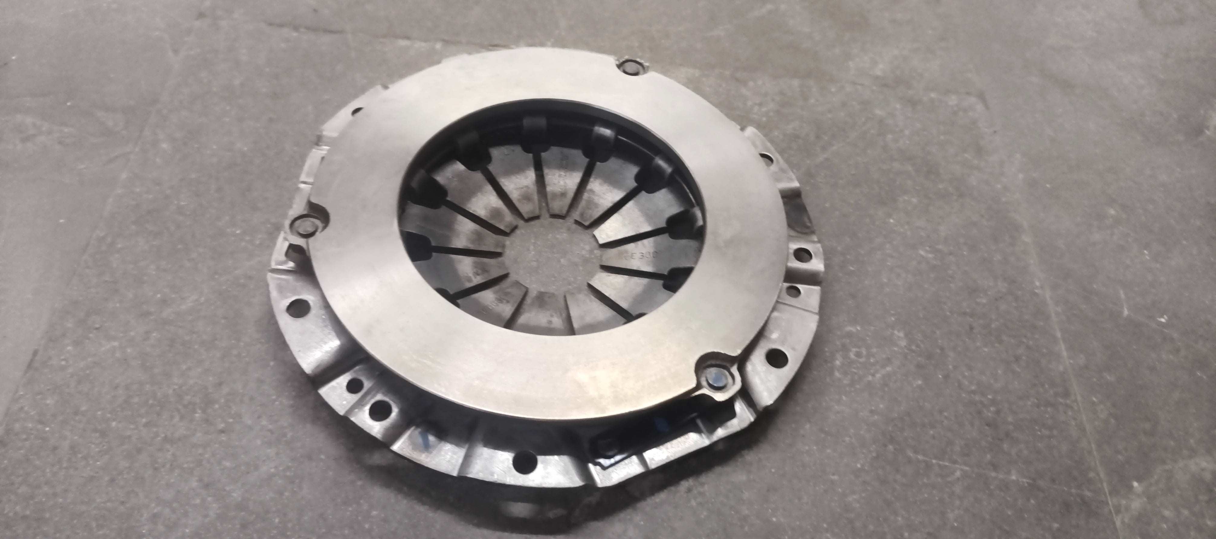 CarTrends pressure plate for Swift Dzire, spare parts component, showing the metal pressure plate with mounting holes.