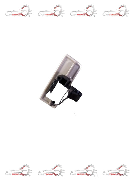 Maruti Suzuki beige lock glove box with key, mounted inside a vehicle's dashboard for secure storage.
