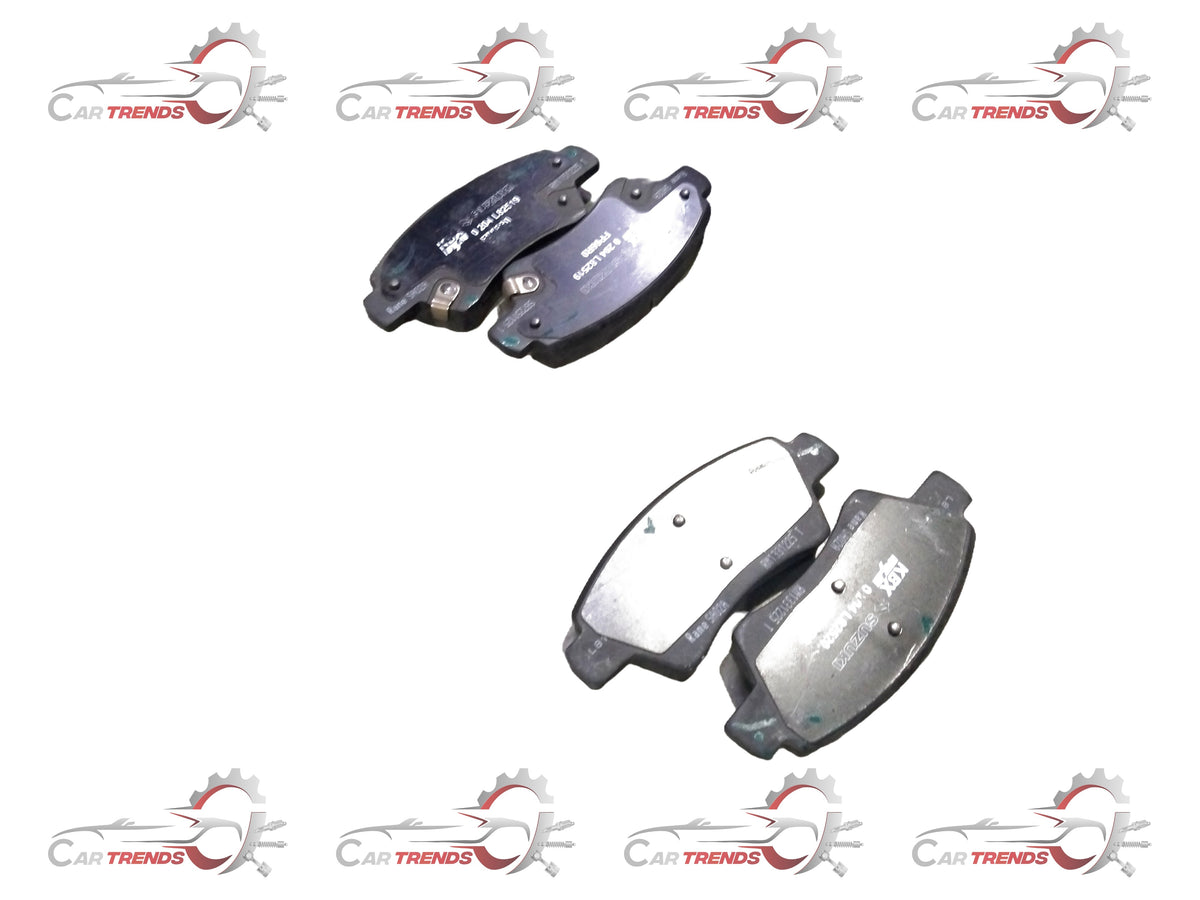Front brake pad for Maruti Suzuki Ignis, part number 55810M66R00, showing the metal friction surface and mounting clips.