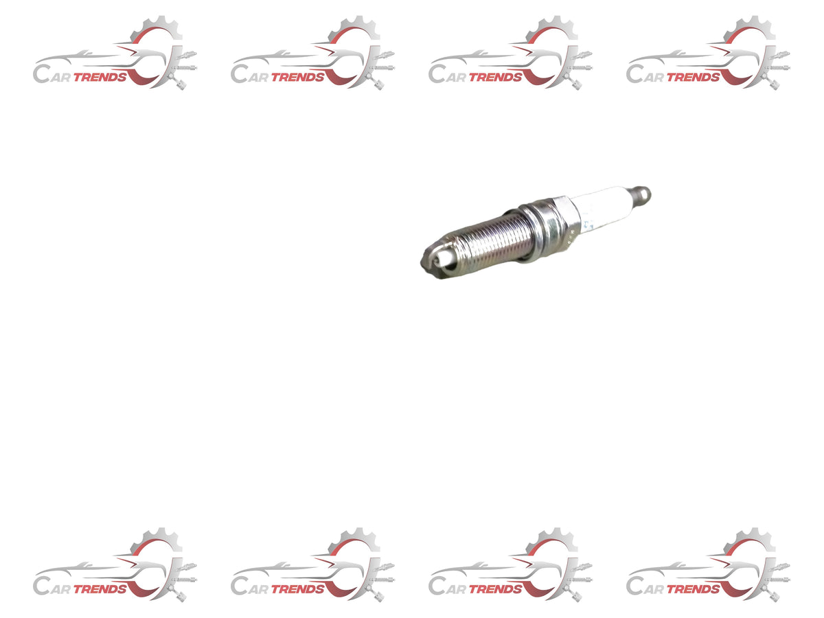 Maruti Suzuki spark plug for Celerio new model, showing a close-up of the ignition component with metal and ceramic parts.