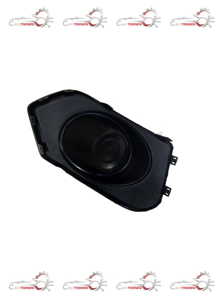 Maruti Suzuki front fog lamp bezel L 71761M56R005PK, close-up view showing the black plastic housing and mounting details.