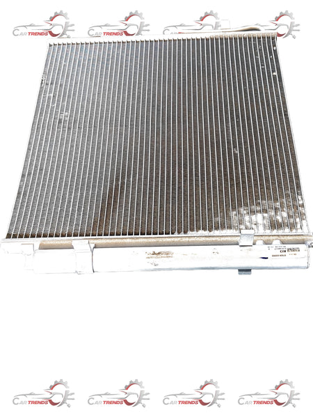 Hyundai CarTrends Aura air condensor for Hyundai vehicles, showing a close-up of the condenser coil and mounting brackets.