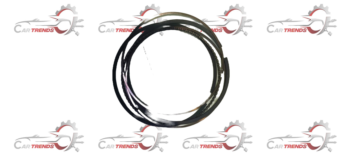 Maruti Alto K10 piston ring set by CarTrends, showing multiple piston rings with metallic finish and packaging on a plain background.