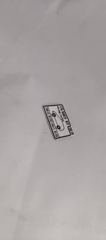 HONDA CAUTION PLATE.(TIRE PRESSURE) 42760TG2T00 42760TG2T00 - Left view