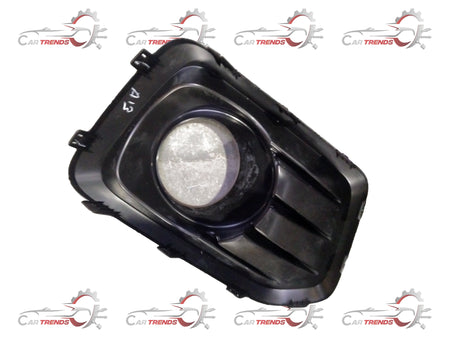 Maruti Suzuki fog lamp bezel front part, model 71751M85S205PK, showing the black plastic frame and mounting details.