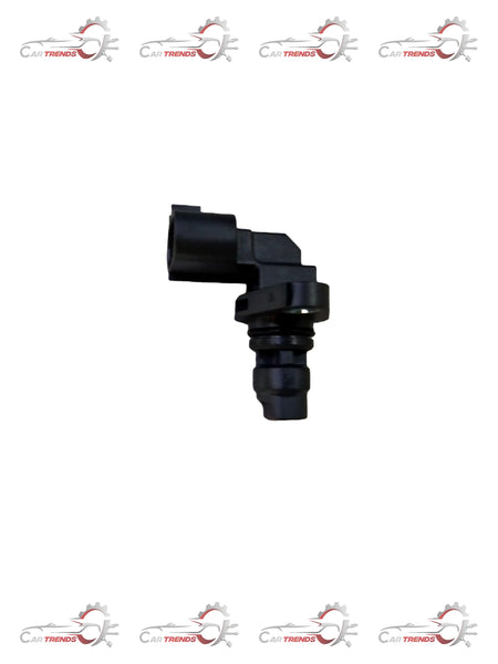 Maruti Suzuki SENSOR ASSYCMP 33220M55K20 sensor part shown in a close-up image, highlighting its electronic components and wiring.