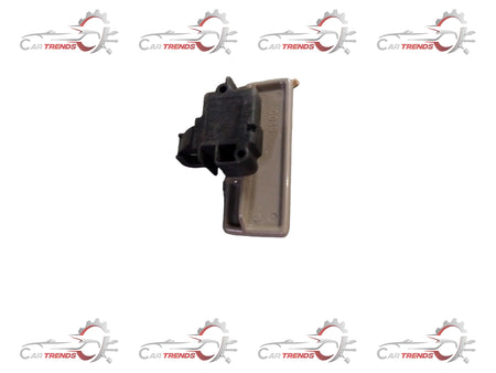 Maruti Suzuki beige lock grove box with secure latch, designed for automotive storage and organization.