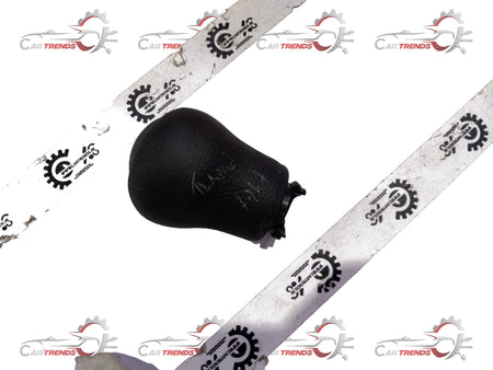 Toyota shift knob lever, model 335040K200C0, close-up view showing black gear shift handle with textured grip.