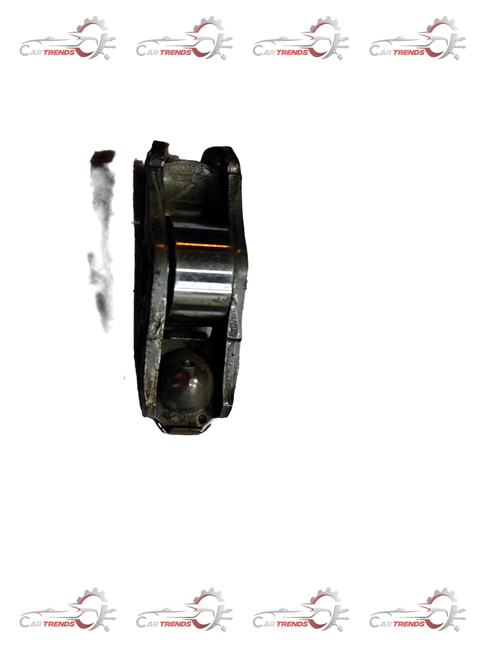 Close-up of Hyundai timing chain guide part, showing its black plastic and metal construction for Hyundai and Kia engines.