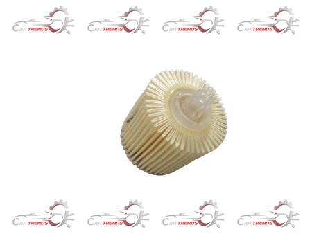 Aftermarket oil filter for Toyota Etios diesel engine, showing the cylindrical metal filter with rubber seals.