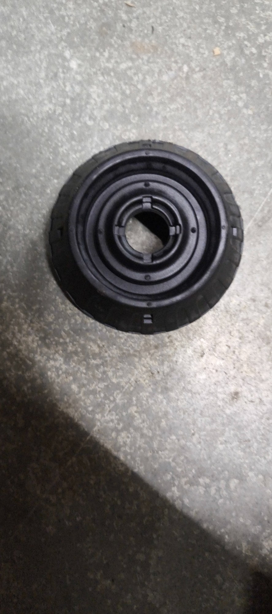 AUTOKOI front strut mount KRPF14211 showing the black rubber and metal assembly for vehicle suspension.