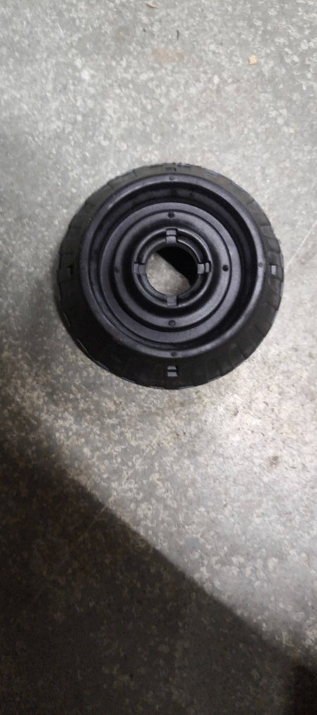 AUTOKOI front strut mount KRPF14211 showing the black rubber and metal assembly for vehicle suspension.