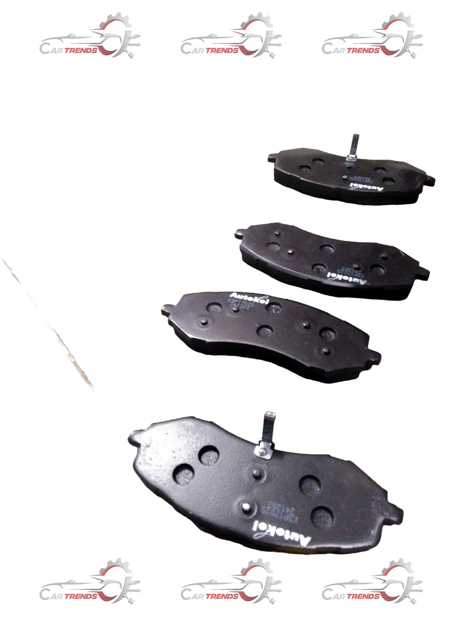 AUTOKOI brake pads and shoe KBPF17025, auto parts, showing the black brake pad set with detailed surface texture.