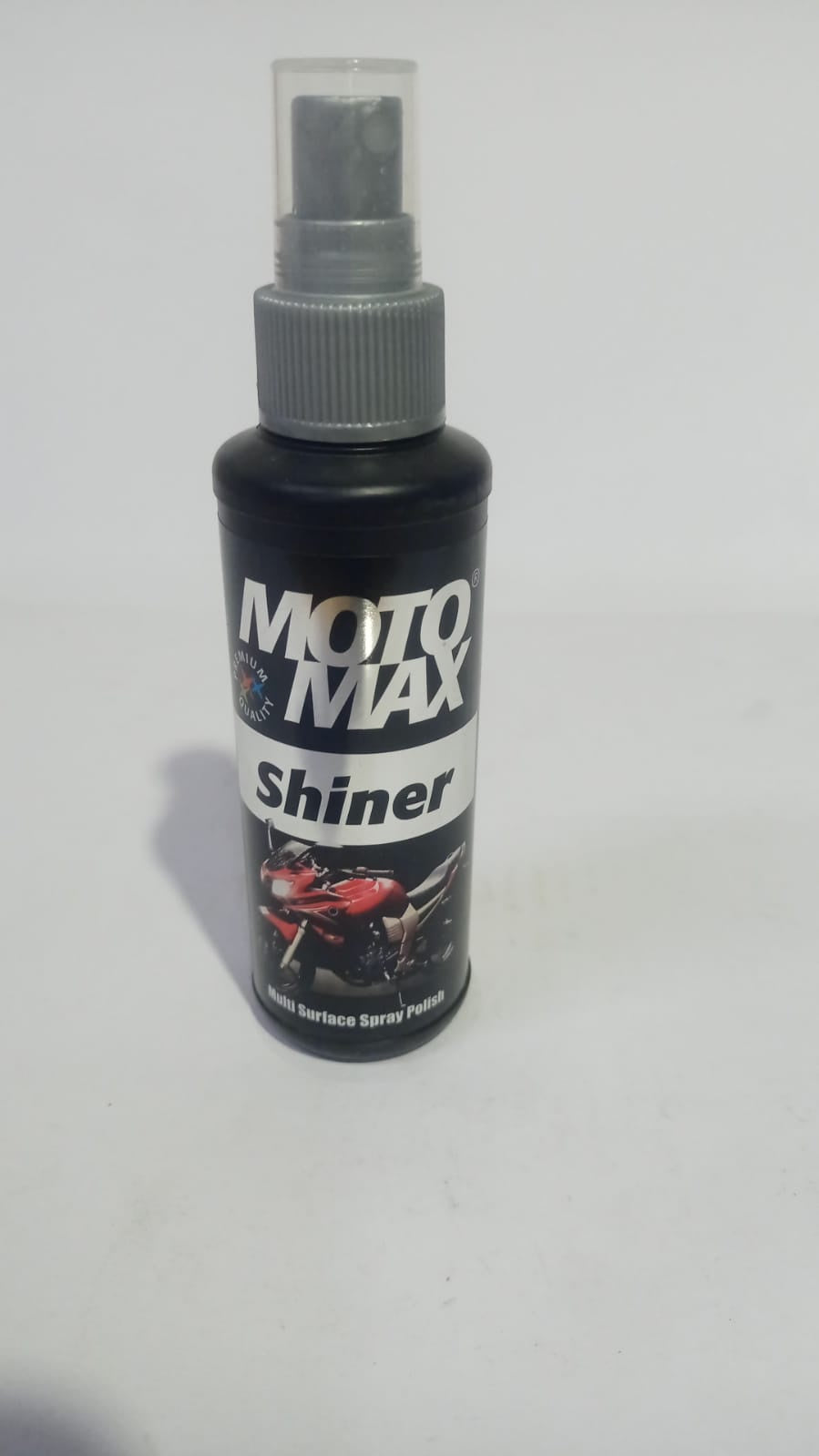 PIDILITE MOTOMAX Shiner Multi-Surface SP Polish in a bottle, designed for cleaning and shining various surfaces.