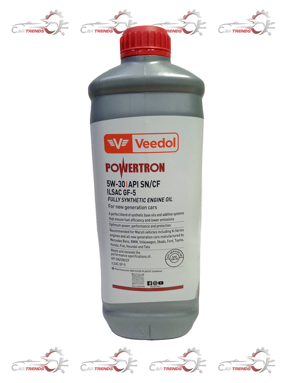Veedol 5W-30 fully synthetic engine oil bottle with label and cap, designed for automotive engine lubrication.