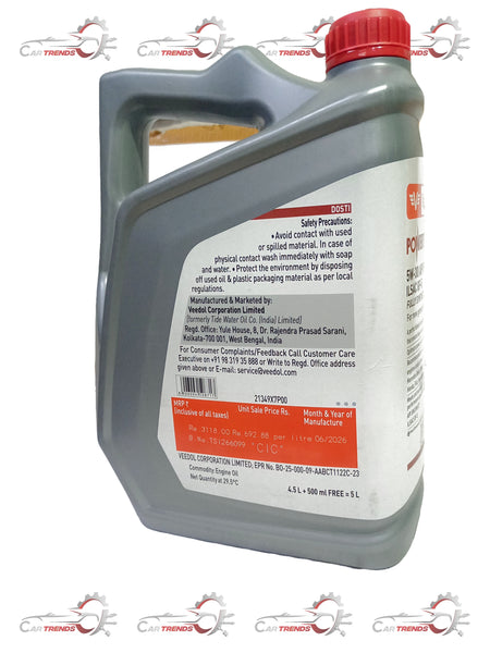 Veedol 5W-30 fully synthetic engine oil bottle, with label showing product details and branding on a white background.