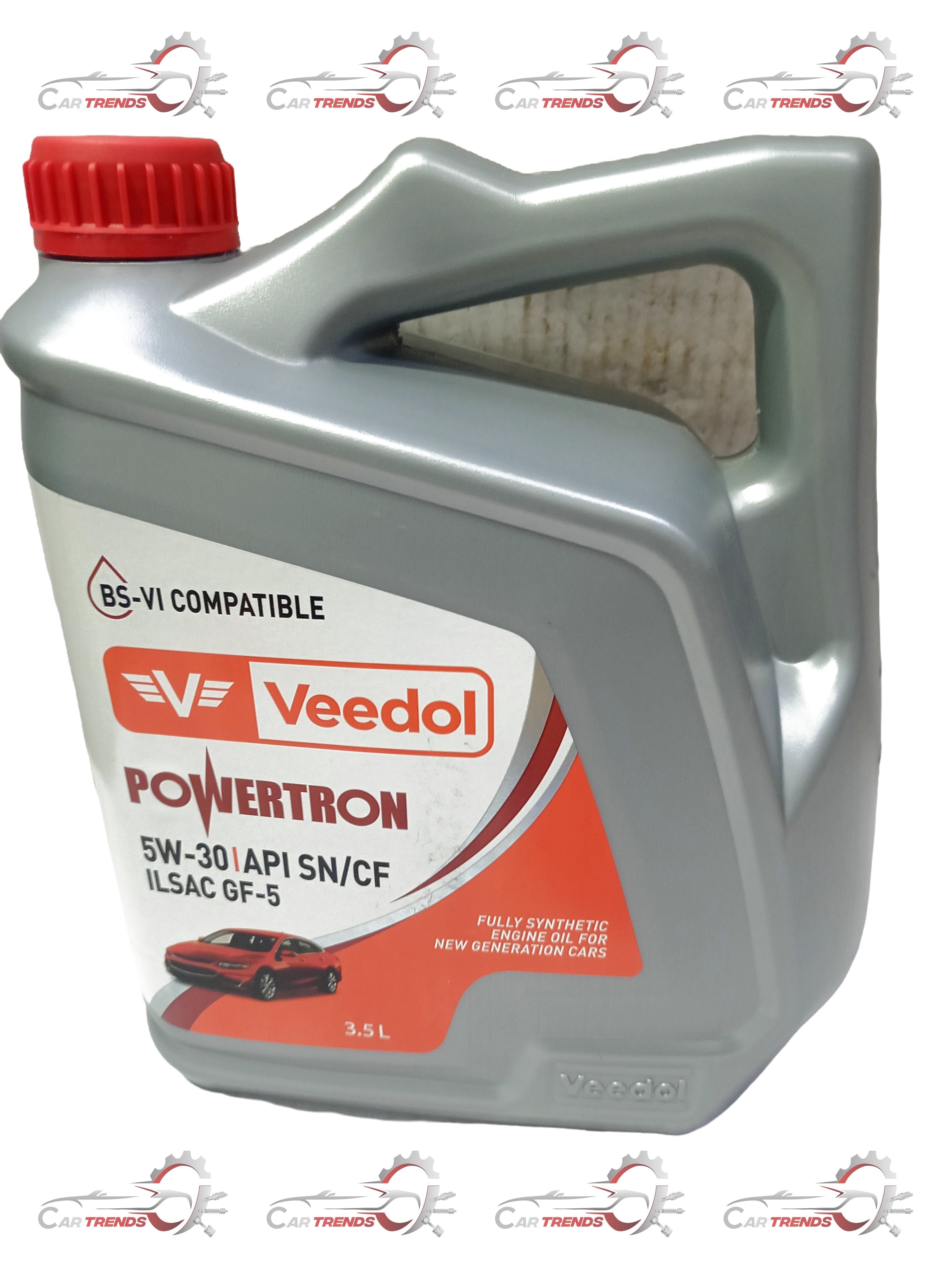 Veedol fully synthetic 5W-30 engine oil bottle with label showing technical specifications and brand logo.