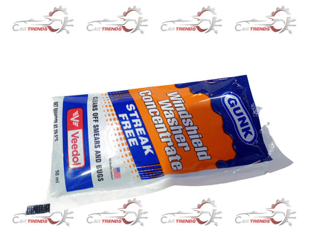 Veedol windshield washer concentrate in a container, ready for vehicle cleaning and windshield maintenance.