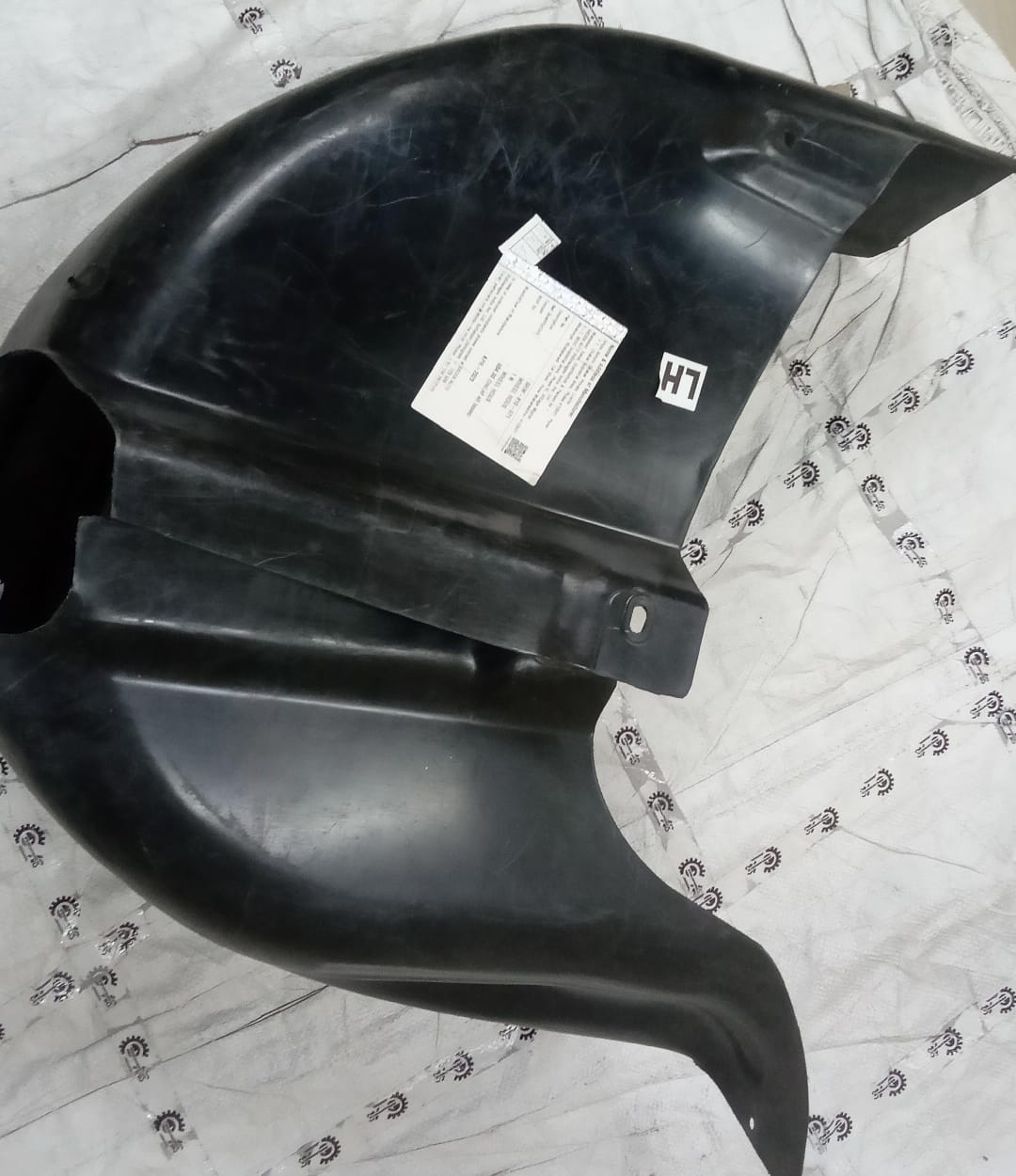 Volkswagen Polo or Ameo LH fender lining, part number 6RW810971, showing the black molded plastic panel for vehicle wheel arch.