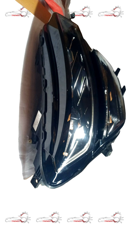 Volkswagen headlamp for Skoda Kushaq, model 6JP941016A, featuring clear lens and durable design for optimal visibility.