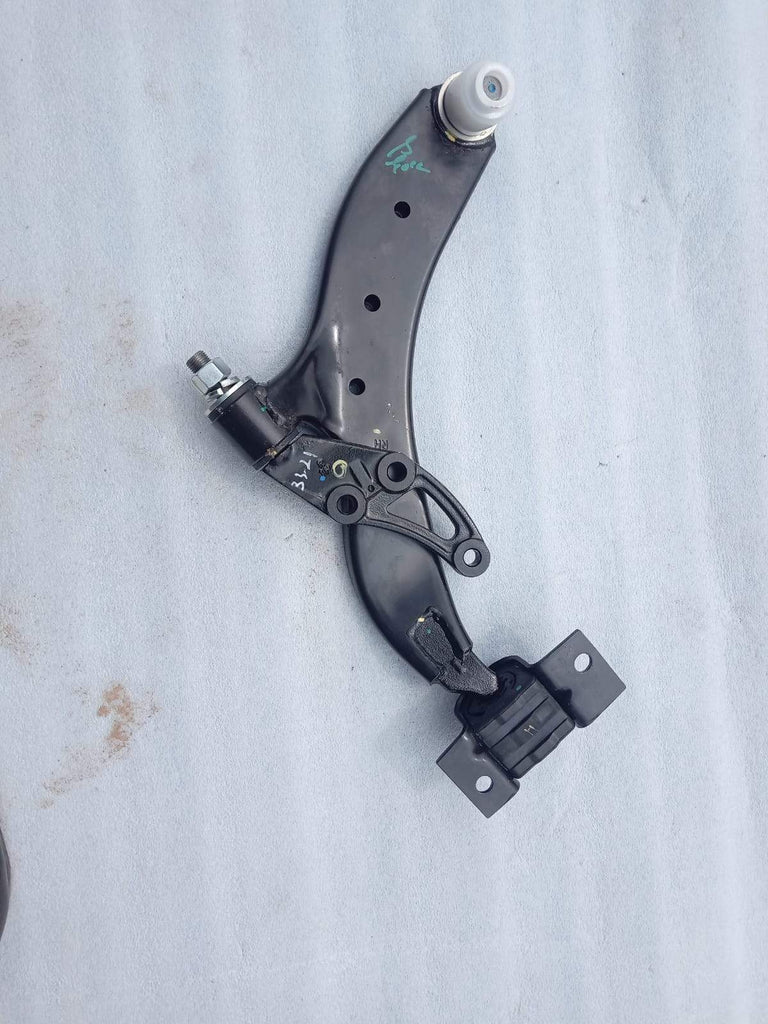 542432100122    Front Suspension Arm Tiago Right Side