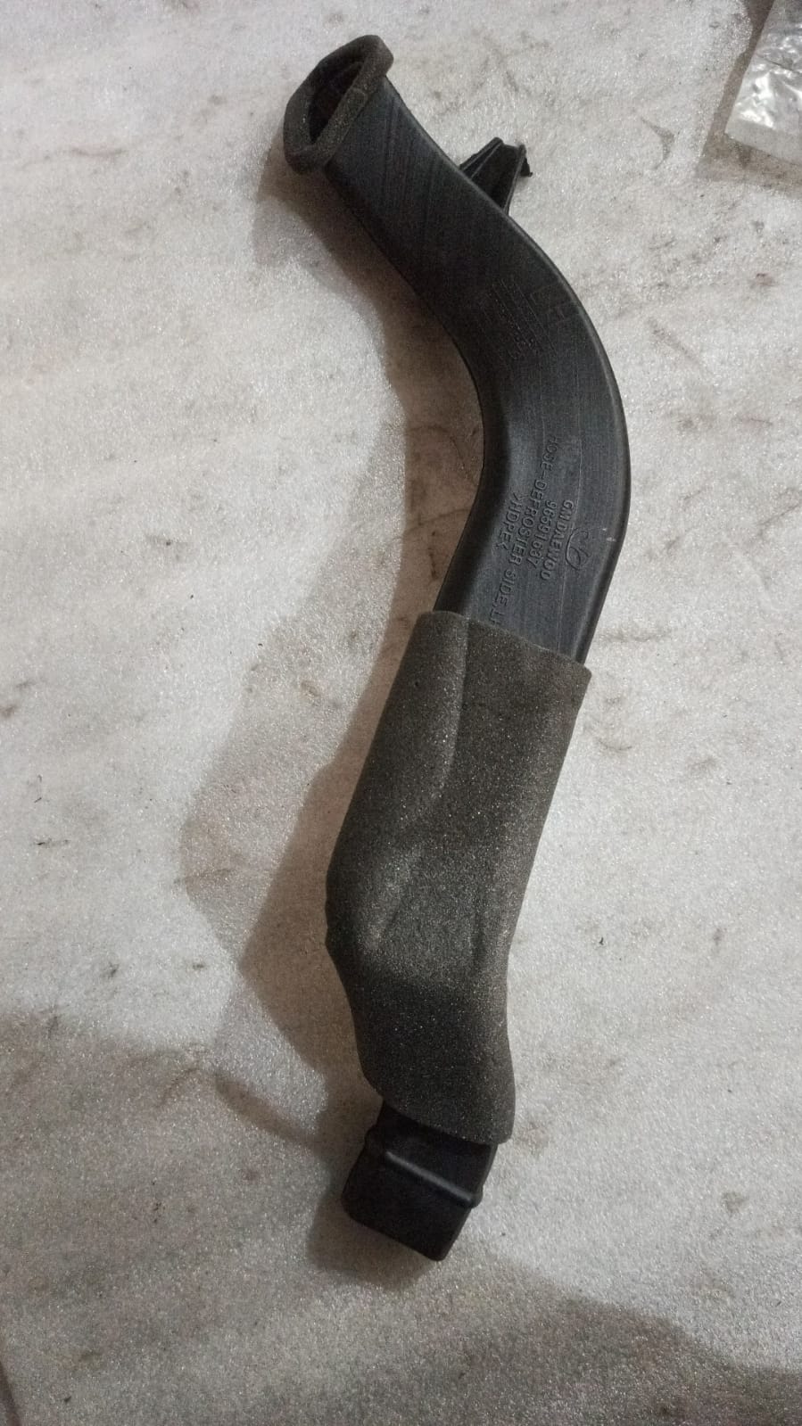 J96591637   Defroster Hose Spark Left Side