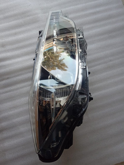 63117419632   Head Lamp BMW 320D Right Side