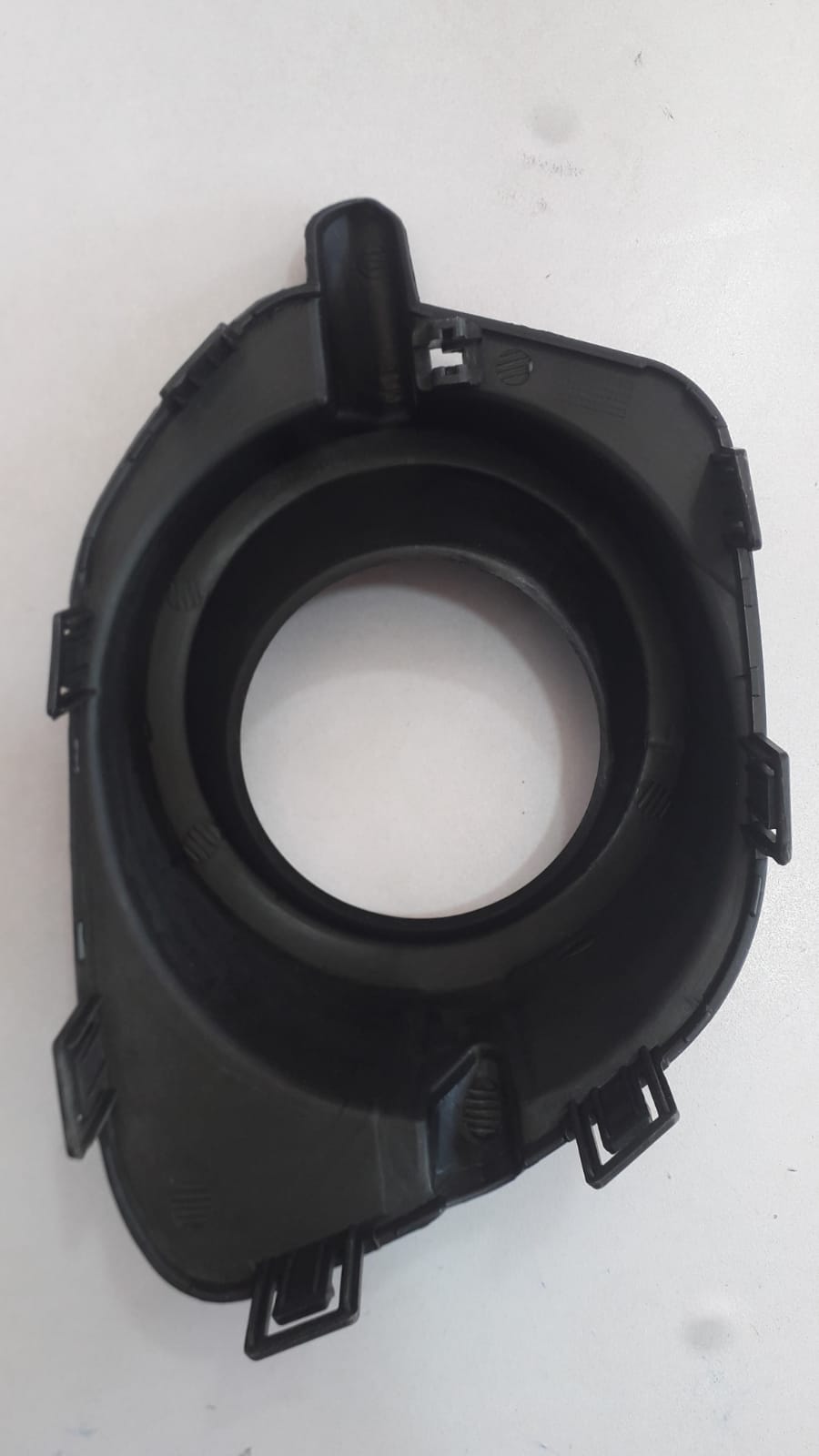 Aftermarket fog lamp cover for Mitsubishi Pajero Sports left-hand side, designed to fit and protect the vehicle's front fog light.