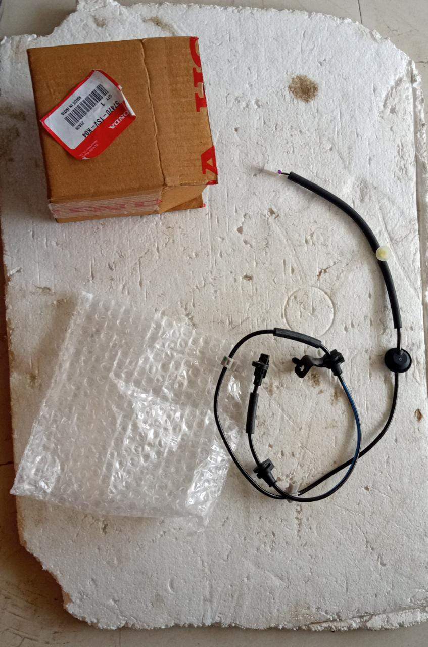 Honda Amaze rear left ABS sensor by CarTrends, showing a close-up of the sensor with wiring and mounting bracket.