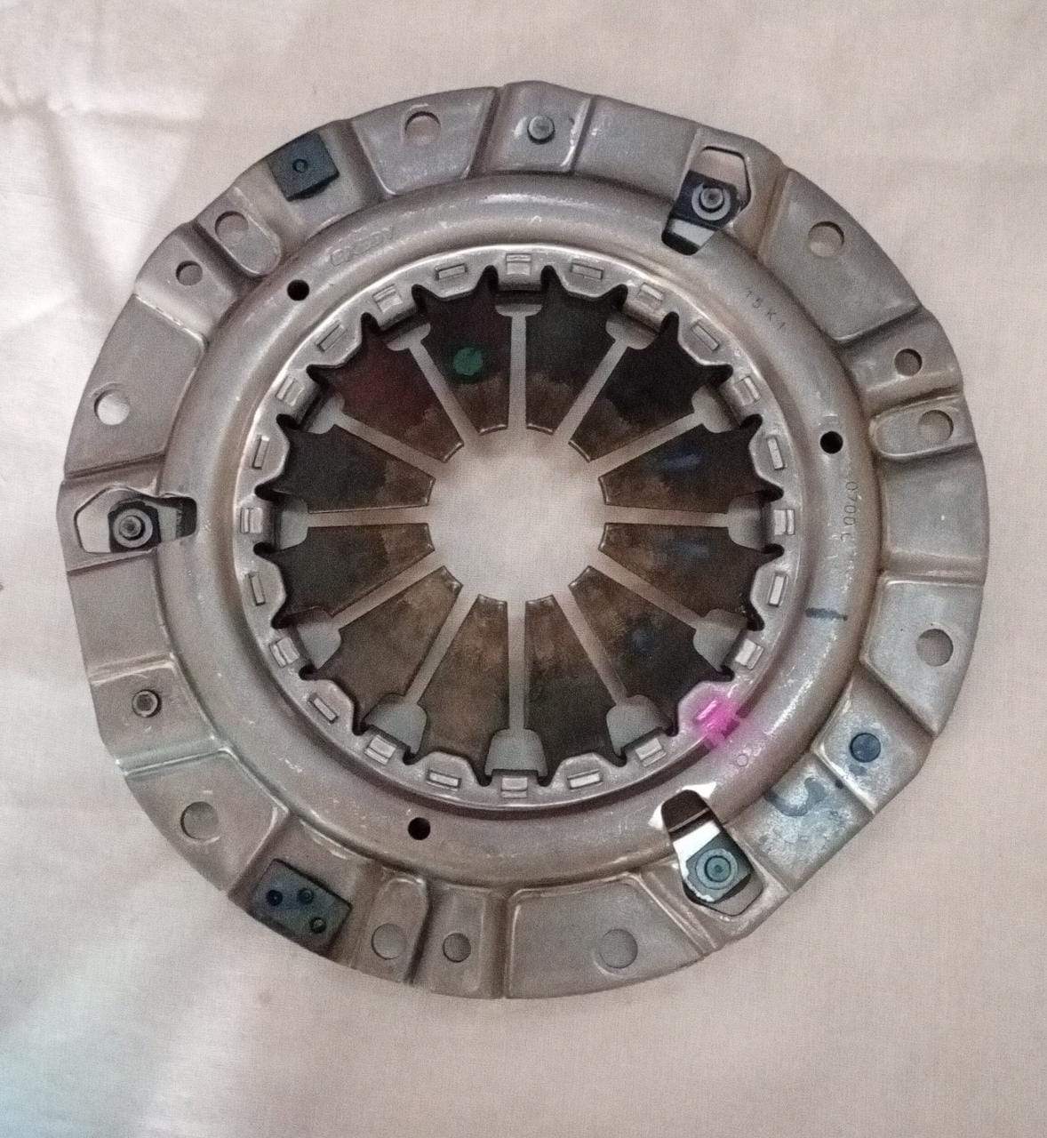 CarTrends pressure plate for Suzuki Swift Dzire, spare car parts component with detailed metal surface and mounting features.