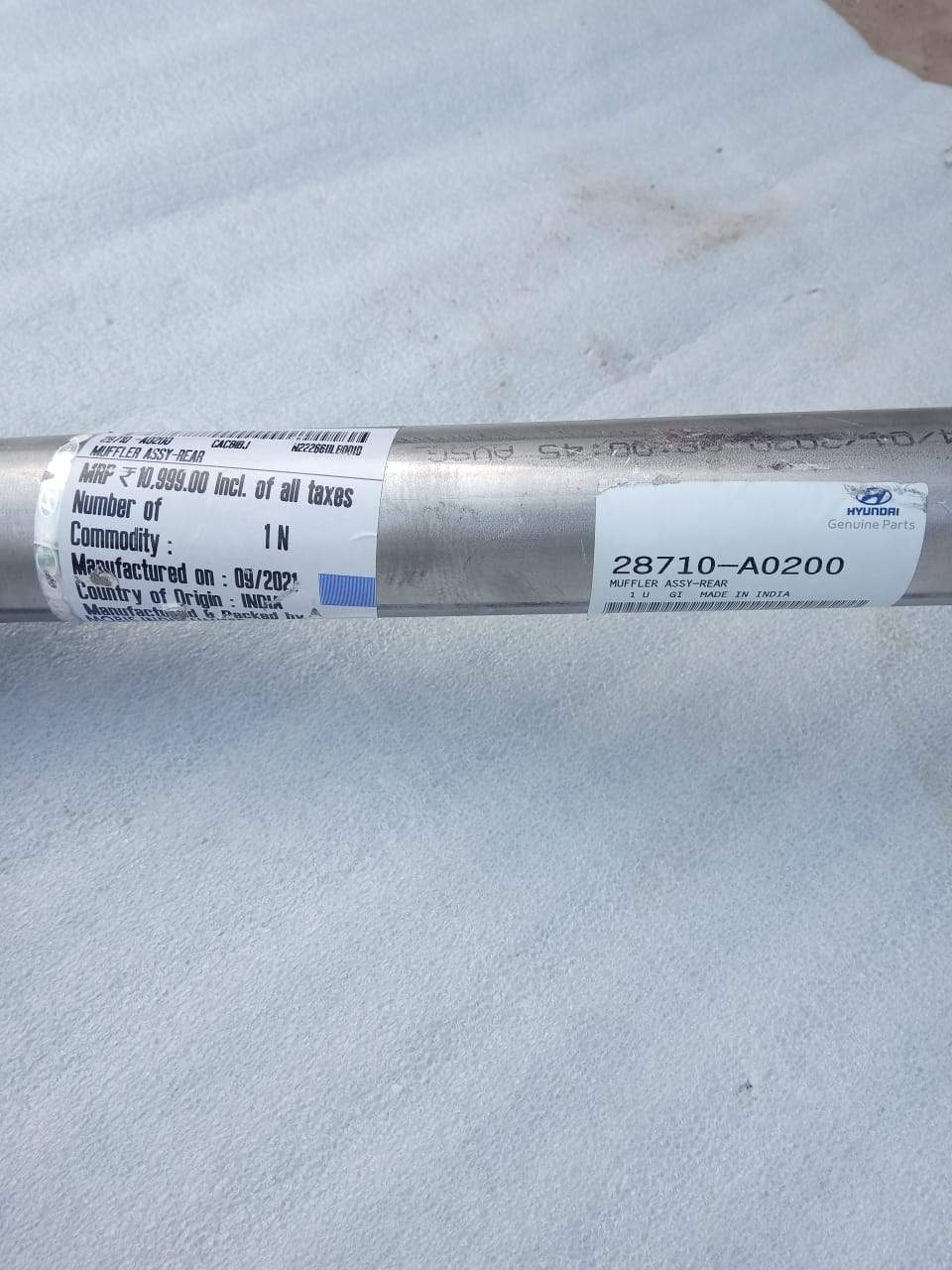 CarTrends diesel silencer spare part for Creta, showing the metal muffler with inlet and outlet pipes.