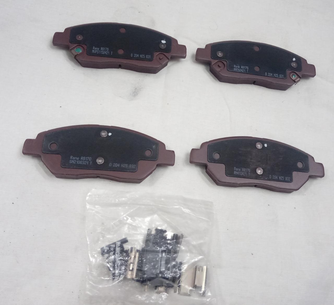 Front brake pad kit for Tata Harrier by CarTrends, showing new brake pads with metallic backing plates.