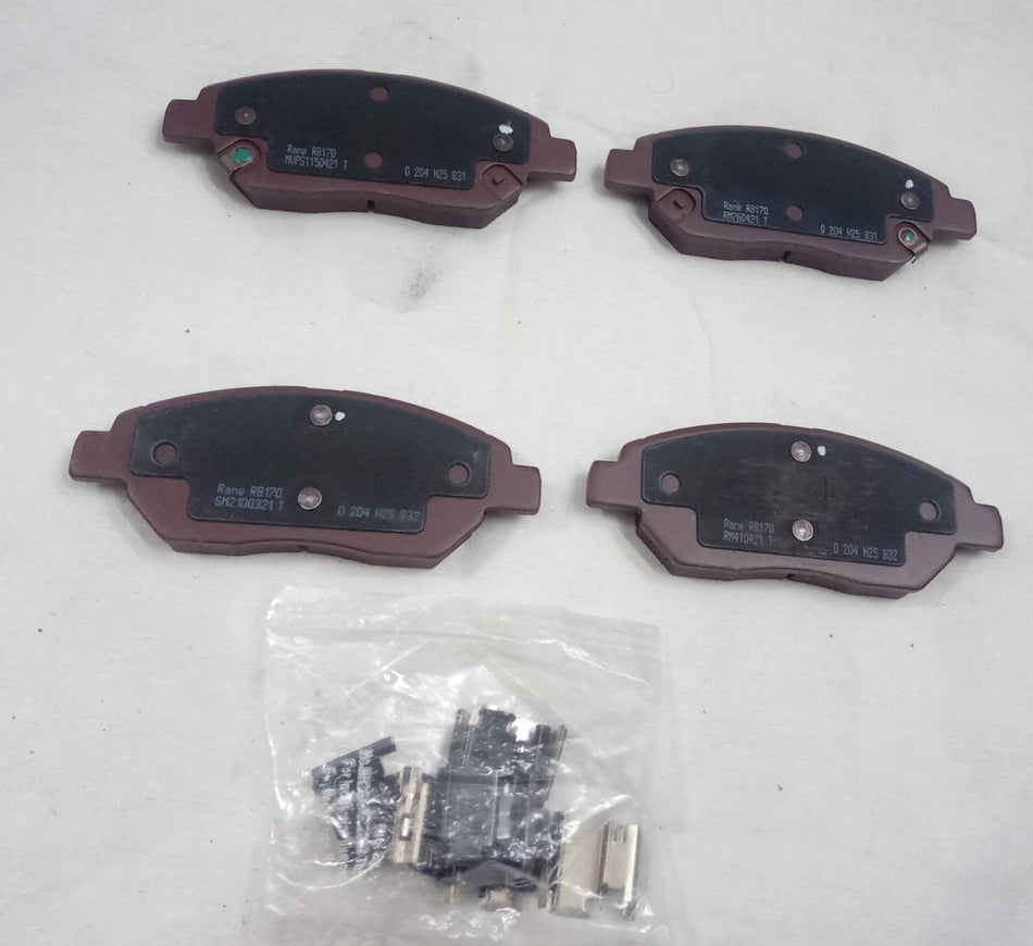 CarTrends front brake pad kit for Tata Harrier, spare parts image showing new brake pads installed in the vehicle's front wheel area.