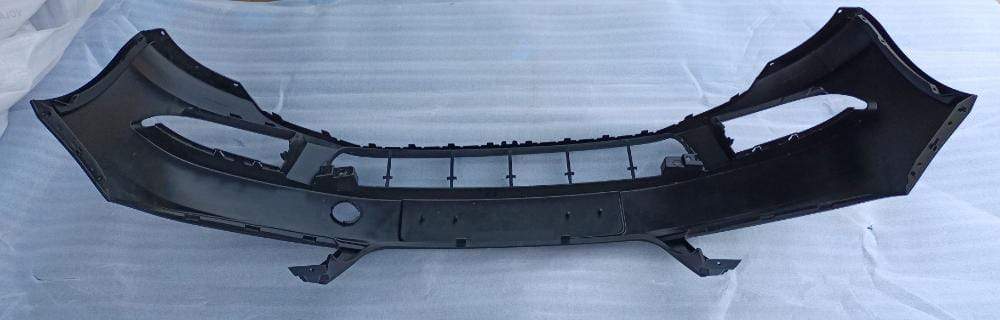 CarTrends front bumper for Skoda Fabia, spare parts image showing the black plastic bumper with mounting points.