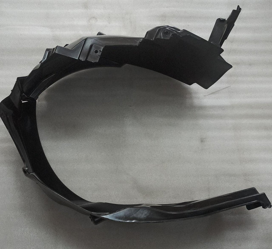 CarTrends lining fender for Maruti Suzuki Celerio, LH front spare part, close-up of the left side fender lining.