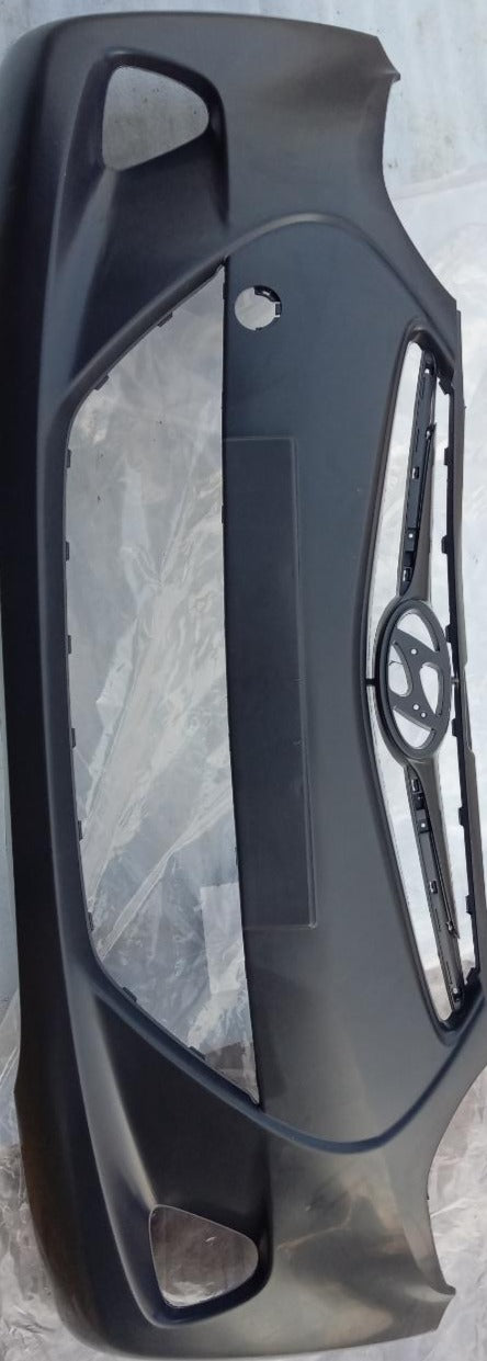 CarTrends front bumper spare part for EON vehicle, shown in a close-up image highlighting the bumper's design and mounting areas.