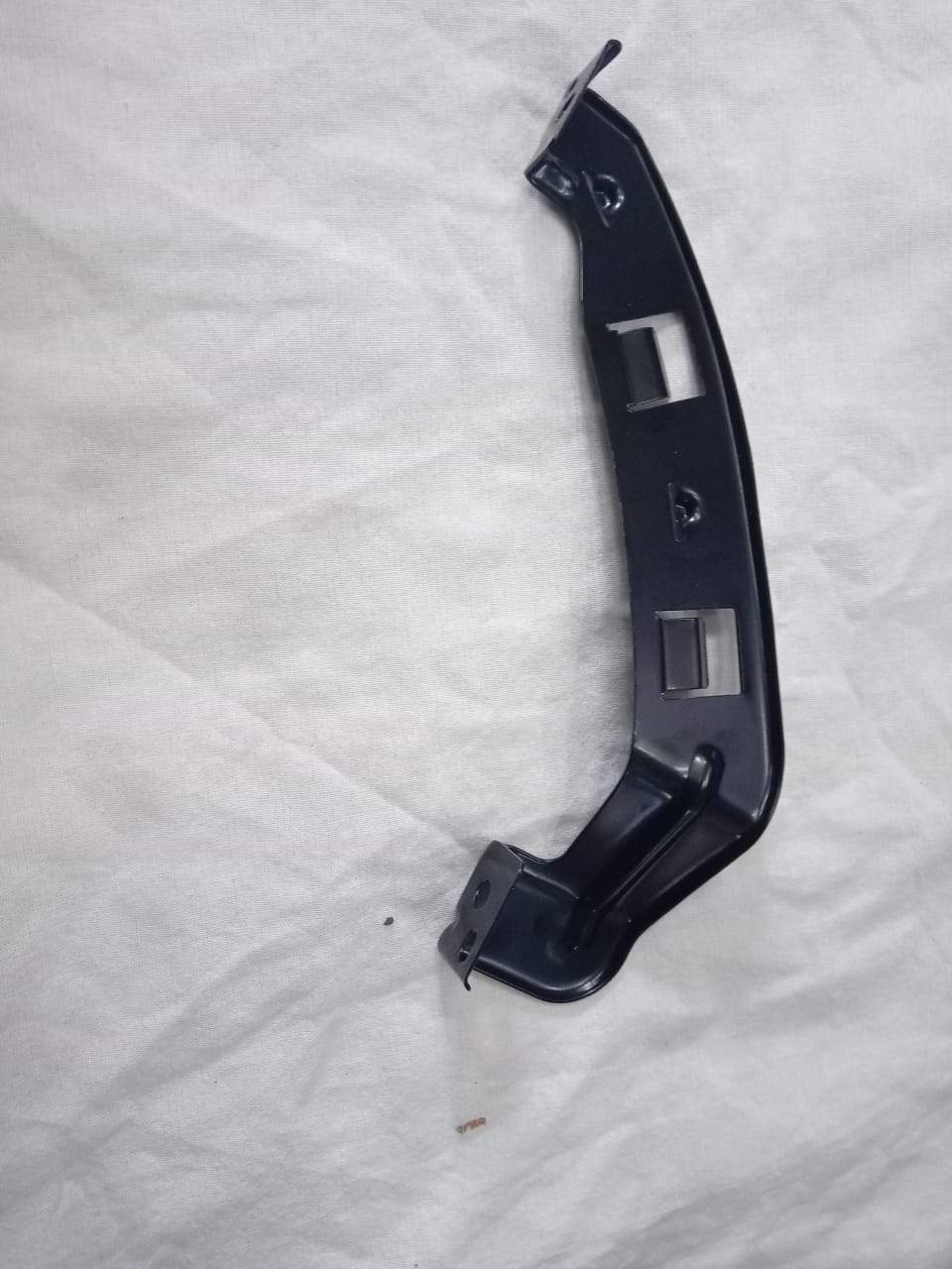 CarTrends headlight bracket for I10, right side, spare parts, durable plastic component for vehicle headlamp assembly.
