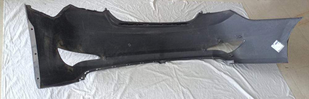 CarTrends rear bumper for Verna Fluidic, spare part in black, shown installed on the vehicle's rear end.