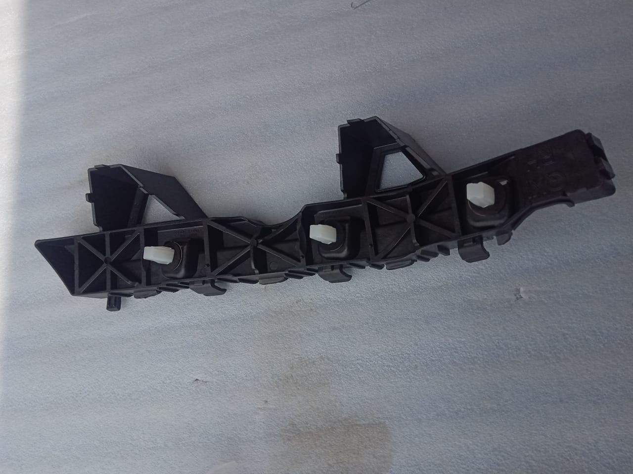 CarTrends rear bumper trim for Hyundai Venue, right side spare part, showcasing the bumper bracket and trim details.