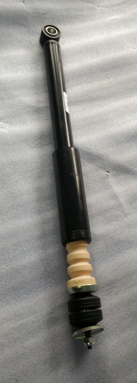 CarTrends rear shock absorber assembly for vehicle suspension, showing the black metal shock in a close-up view.