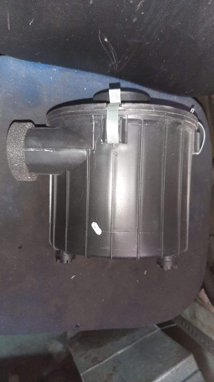 CarTrends air cleaner assembly for Tavera T97690890, spare part showing the filter and plastic housing.