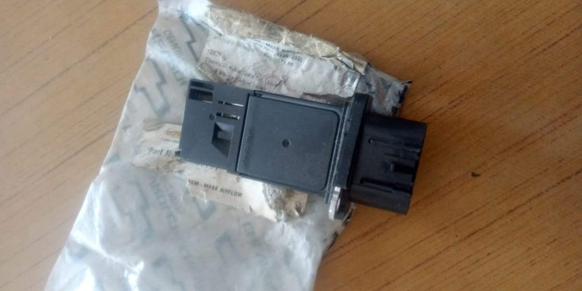 CarTrends Air Mass Sensor Enjoy J15865791, automotive spare part with metal components and electrical connectors.