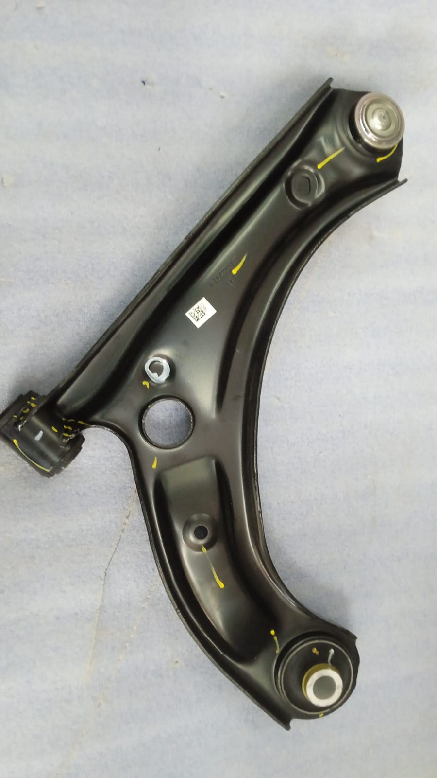 CarTrends front left arm assembly for suspension, automotive spare part with part number 45202M72R00, shown in the image.