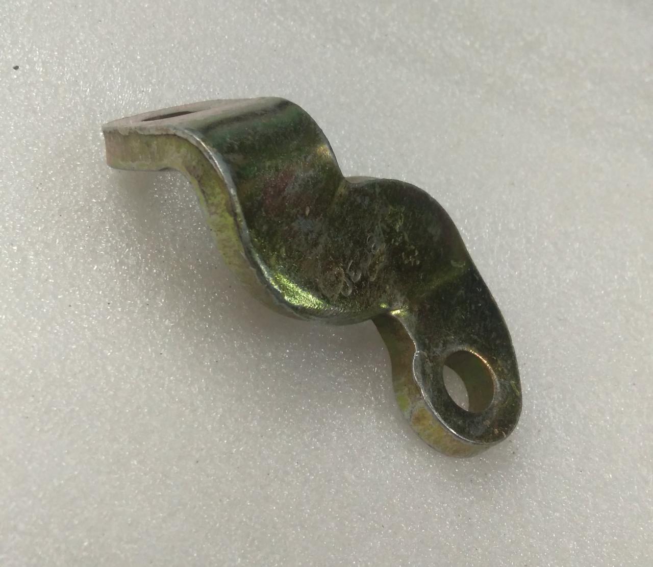 CarTrends bracket for exhaust pipe on Tavera, showing a metal mounting part for vehicle exhaust system.