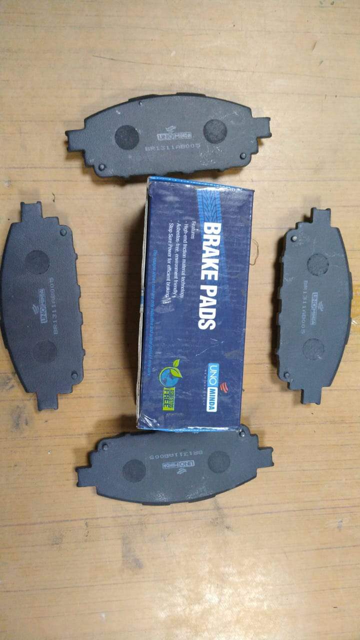 CarTrends brake pad for Toyota Innova Crysta front, spare part BR1311, showing the new brake pad with detailed surface features.