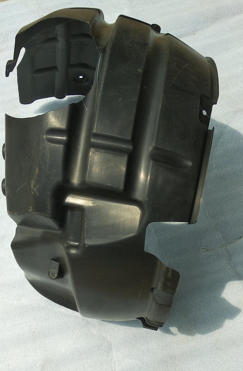 CarTrends CN1Z16103C front left fender lining for EcoSport, close-up of the spare part showing textured plastic material.